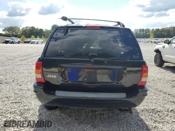 2000 Jeep Grand Cherokee Laredo with VIN 1J4G258S5YC193875, listed as a Copart auction lot 74731704 with Not provided miles and Salvage title. Bid and sale history available at DreamBid. Image 6.