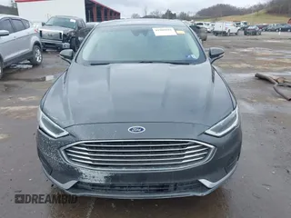 2019 Ford Fusion SEL with VIN 3FA6P0CD6KR141832, listed as a IAAI auction lot 41800102 with 142,282 mi miles and . Bid and sale history available at DreamBid. Image 13.
