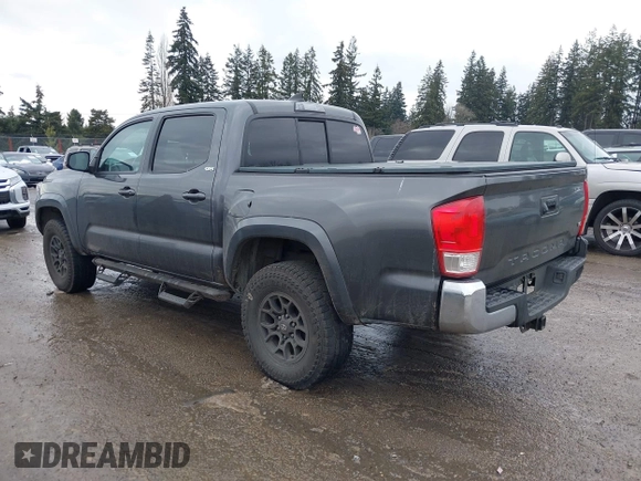 2017 Toyota Tacoma SR5 with VIN 3TMAZ5CN5HM038170, listed as a IAAI auction lot 41588399 with 152,469 mi miles. Bid and sale history available at carsss.com. Image 3.