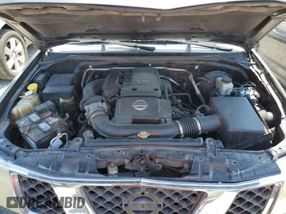2006 Nissan Frontier Nismo z VIN 1N6AD06W06C449364, wystawiony jako Copart lot #66186774 z przebiegiem 320 070 mil mil oraz Szkoda całkowita • Salvage title. Historia ofert i sprzedaży dostępna na DreamBid. Obrazek 11.