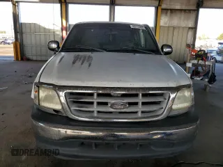 2000 Ford F-150 XL with VIN 1FTRX17W1YNB88948, listed as a Copart auction lot 83114404 with 288,100 mi miles and Salvage Title. Bid and sale history available at carsss.com. Image 5.