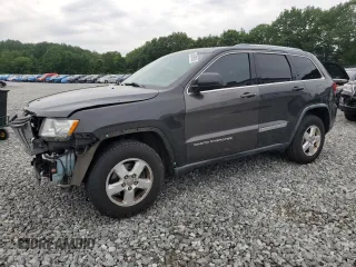 2011 Jeep Grand Cherokee Laredo with VIN 1J4RR4GG1BC600545, listed as a Copart auction lot 63439555 with 157,830 mi miles and Clean title. Bid and sale history available at DreamBid. Image 1.