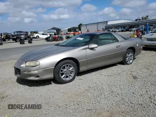 2002 Chevrolet Camaro z VIN 2G1FP22K522118653, wystawiony jako Copart lot #56799195 z przebiegiem 132 605 mil mil oraz Czysty tytuł • Clean title. Historia ofert i sprzedaży dostępna na DreamBid. Obrazek 1.