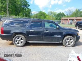 2011 Chevrolet Suburban LTZ with VIN 1GNSKKE38BR359006, listed as a IAAI auction lot 42183589 with 162,154 mi miles and . Bid and sale history available at DreamBid. Image 14.