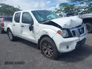 2020 Nissan Frontier SV z VIN 1N6ED0EB2LN720957, wystawiony jako IAAI lot #42302933 z przebiegiem 73 036 mil mil oraz . Historia ofert i sprzedaży dostępna na DreamBid. Obrazek 1.