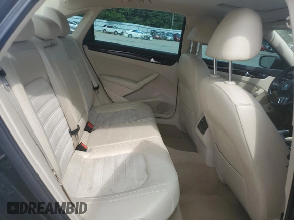2014 Volkswagen Passat SEL Premium with VIN 1VWCN7A3XEC062797, listed as a Copart auction lot 60290515 with 83,279 mi miles and Salvage title. Bid and sale history available at DreamBid. Image 10.