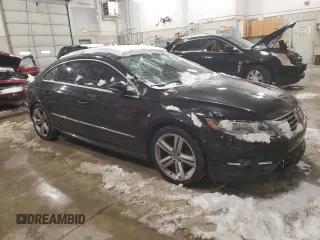 2014 Volkswagen CC R-Line with VIN WVWBP7AN9EE540545, listed as a Copart auction lot 82663144 with 103,402 mi miles and Salvage Title. Bid and sale history available at carsss.com. Image 4.