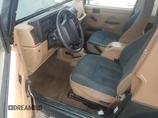 2001 Jeep Wrangler Sahara with VIN 1J4FA59S51P324010, listed as a Copart auction lot 43264515 with 163,056 mi miles and Salvage Title. Bid and sale history available at carsss.com. Image 8.