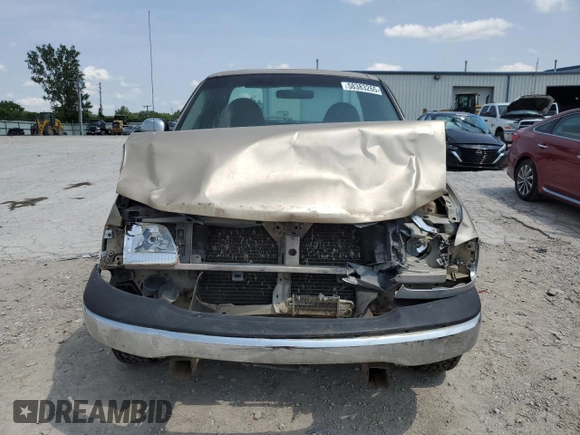1999 Ford F-150 with VIN 1FTRF17W8XKA37849, listed as a Copart auction lot 58383265 with Not provided miles and Salvage title. Bid and sale history available at DreamBid. Image 5.