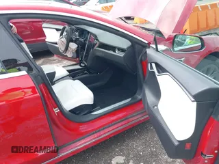 2018 Tesla Model S 75D with VIN 5YJSA1E21JF275546, listed as a IAAI auction lot 42061595 with Not Provided miles and . Bid and sale history available at DreamBid. Image 5.