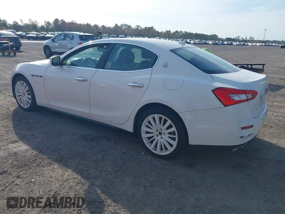 2015 Maserati Ghibli with VIN ZAM57XSA6F1156252, listed as a IAAI auction lot 41530186 with 84,417 mi miles and . Bid and sale history available at DreamBid. Image 3.