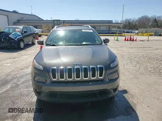 2015 Jeep Cherokee Latitude with VIN 1C4PJLCS0FW707387, listed as a Copart auction lot 48953465 with 140,965 mi miles and Salvage Title. Bid and sale history available at carsss.com. Image 14.