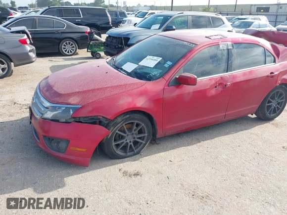 2010 Ford Fusion SE z VIN 3FAHP0HA5AR372985, wystawiony jako IAAI lot #42259289 z przebiegiem 175 809 mil mil oraz . Historia ofert i sprzedaży dostępna na DreamBid. Obrazek 17.