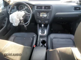 2014 Volkswagen Jetta SEL z VIN 3VWL17AJ6EM438176, wystawiony jako Copart lot #85081294 z przebiegiem 108 420 mil mil oraz Szkoda całkowita • Salvage title. Historia ofert i sprzedaży dostępna na DreamBid. Obrazek 8.