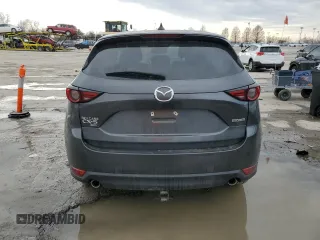 2021 Mazda CX-5 Grand Touring with VIN JM3KFBDM9M0452011, listed as a Copart auction lot 46230945 with 54,825 mi miles and Salvage Title. Bid and sale history available at carsss.com. Image 6.