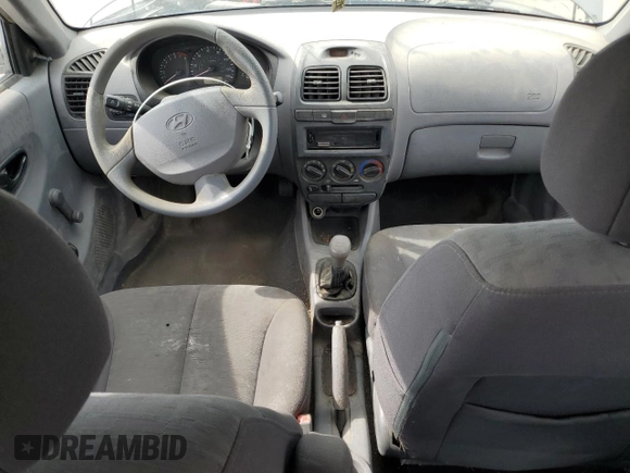 2004 Hyundai Accent GL with VIN KMHCG35C34U290855, listed as a Copart auction lot 70719664 with 176,210 mi miles and Salvage Title. Bid and sale history available at carsss.com. Image 8.