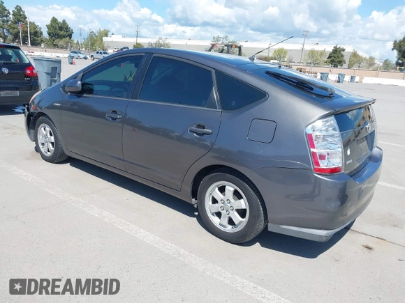 2007 Toyota Prius z VIN JTDKB20U273215633, wystawiony jako IAAI lot #41955538 z przebiegiem 172 957 mil mil oraz . Historia ofert i sprzedaży dostępna na DreamBid. Obrazek 3.