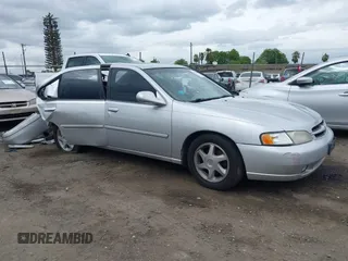 1999 Nissan Altima XE with VIN 1N4DL01DXXC132336, listed as a IAAI auction lot 41926059 with 212,798 mi miles and . Bid and sale history available at carsss.com. Image 14.