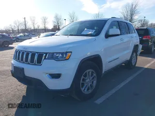2019 Jeep Grand Cherokee Laredo E with VIN 1C4RJFAG7KC694674, listed as a IAAI auction lot 41591678 with 61,144 mi miles. Bid and sale history available at carsss.com. Image 17.