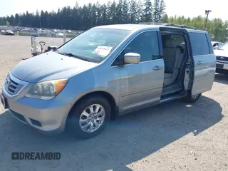 2009 Honda Odyssey EX-L with VIN 5FNRL38779B013943, listed as a IAAI auction lot 42119422 with 147,285 mi miles. Bid and sale history available at carsss.com. Image 2.