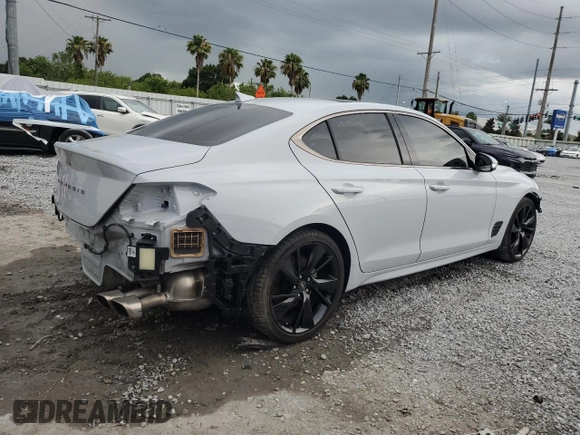 2023 Genesis G70 2.0T with VIN KMTG34TA3PU114905, listed as a Copart auction lot 61777435 with 26,493 mi miles and Salvage title. Bid and sale history available at DreamBid. Image 3.