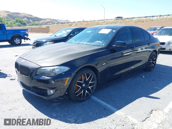 2013 BMW 5 Series 528i with VIN WBAXG5C50DDY35638, listed as a IAAI auction lot 39657715 with 139,765 mi miles and . Bid and sale history available at carsss.com. Image 2.