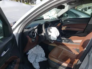 2018 Alfa Romeo Stelvio z VIN ZASFAKAN1J7B89142, wystawiony jako IAAI lot #42192248 z przebiegiem Nie podano mil oraz . Historia ofert i sprzedaży dostępna na DreamBid. Obrazek 18.