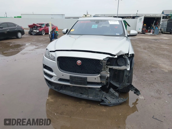 2020 Jaguar F-Pace 25t Premium z VIN SADCJ2FX2LA620720, wystawiony jako IAAI lot #41704850 z przebiegiem 57 113 mil mil oraz . Historia ofert i sprzedaży dostępna na DreamBid. Obrazek 13.