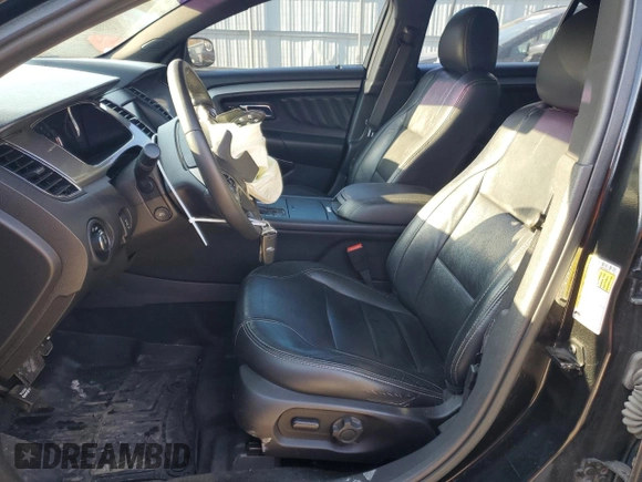 2015 Ford Taurus SEL z VIN 1FAHP2E85FG151155, wystawiony jako Copart lot #77791634 z przebiegiem 224 144 mil mil oraz Szkody całkowita. Historia ofert i sprzedaży dostępna na DreamBid. Obrazek 7.