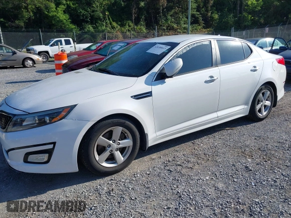 2015 Kia Optima LX with VIN 5XXGM4A70FG472650, listed as a IAAI auction lot 42698013 with 213,713 mi miles and . Bid and sale history available at DreamBid. Image 2.