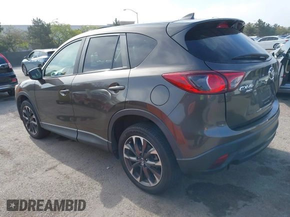 2016 Mazda CX-5 Grand Touring z VIN JM3KE4DY2G0684066, wystawiony jako IAAI lot #42078725 z przebiegiem 200 129 mil mil oraz . Historia ofert i sprzedaży dostępna na DreamBid. Obrazek 3.