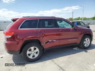 2016 Jeep Grand Cherokee Laredo with VIN 1C4RJFAG8GC413490, listed as a Copart auction lot 62347445 with 104,056 mi miles and Salvage title. Bid and sale history available at DreamBid. Image 3.
