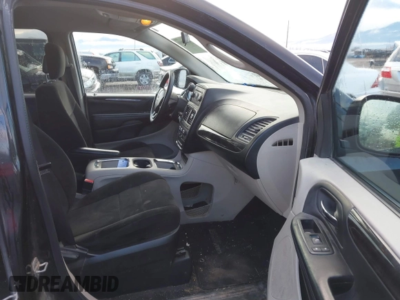 2012 Dodge Grand Caravan SXT with VIN 2C4RDGCG3CR318900, listed as a IAAI auction lot 41145958 with 201,117 mi miles and . Bid and sale history available at DreamBid. Image 5.