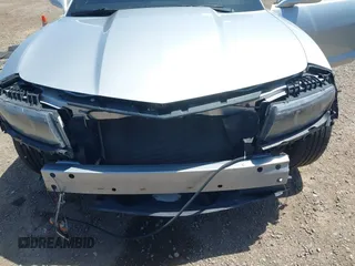 2014 Chevrolet Camaro LT z VIN 2G1FG1E30E9207699, wystawiony jako IAAI lot #42256519 z przebiegiem 107 219 mil mil oraz . Historia ofert i sprzedaży dostępna na DreamBid. Obrazek 6.