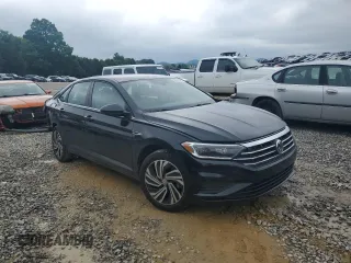 2021 Volkswagen Jetta SEL z VIN 3VWE57BU5MM013374, wystawiony jako Copart lot #58579395 z przebiegiem 50 968 mil mil oraz Czysty tytuł • Clean title. Historia ofert i sprzedaży dostępna na DreamBid. Obrazek 4.