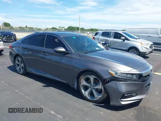 2019 Honda Accord Sport with VIN 1HGCV2F33KA015408, listed as a IAAI auction lot 42601670 with 71,969 mi miles and . Bid and sale history available at DreamBid. Image 1.