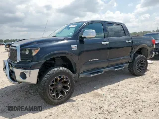 2011 Toyota Tundra z VIN 5TFEY5F10BX113954, wystawiony jako Copart lot #59892365 z przebiegiem 132 930 mil mil oraz Szkoda całkowita • Salvage title. Historia ofert i sprzedaży dostępna na DreamBid. Obrazek 1.