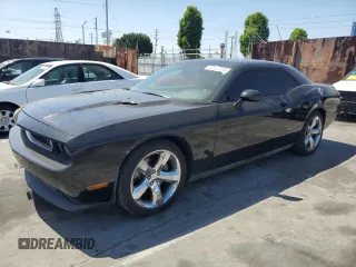 2012 Dodge Challenger R/T Plus z VIN 2C3CDYBT7CH264070, wystawiony jako Copart lot #57353955 z przebiegiem 91 851 mil mil oraz Szkoda całkowita • Salvage title. Historia ofert i sprzedaży dostępna na DreamBid. Obrazek 1.