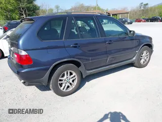 2005 BMW X5 3.0i with VIN 5UXFA13505LY15694, listed as a IAAI auction lot 42051677 with 104,559 mi miles. Bid and sale history available at carsss.com. Image 4.