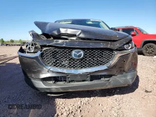 2021 Mazda CX-30 Select with VIN 3MVDMABL3MM252300, listed as a Copart auction lot 61505535 with 29,166 mi miles and Salvage title. Bid and sale history available at DreamBid. Image 5.