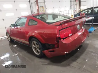 2006 Ford Mustang Standard with VIN 1ZVHT80N865227465, listed as a IAAI auction lot 41272926 with 134,695 mi miles. Bid and sale history available at carsss.com. Image 3.