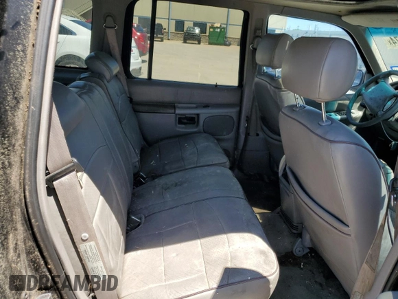 1997 Ford Explorer XLT with VIN 1FMDU35P5VZB51640, listed as a Copart auction lot 52030474 with 214,647 mi miles and Clean title. Bid and sale history available at DreamBid. Image 10.