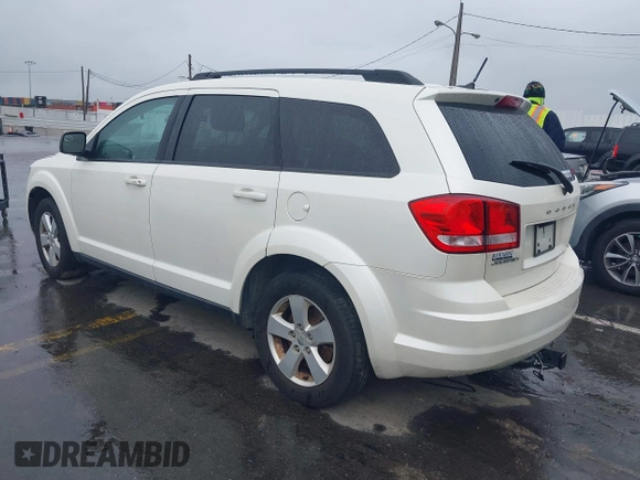 2013 Dodge Journey SE with VIN 3C4PDCAB1DT558033, listed as a IAAI auction lot 41804619 with 204,567 mi miles and . Bid and sale history available at carsss.com. Image 3.