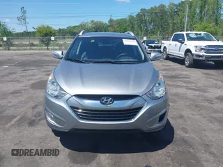 2013 Hyundai Tucson GLS with VIN KM8JU3AC4DU588062, listed as a IAAI auction lot 42080348 with 76,937 mi miles. Bid and sale history available at carsss.com. Image 12.