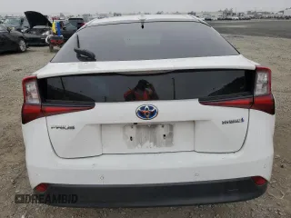 2021 Toyota Prius L Eco with VIN JTDKAMFU9M3146148, listed as a Copart auction lot 60747745 with 145,146 mi miles and Salvage title. Bid and sale history available at DreamBid. Image 6.