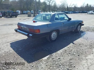 1987 Mercedes-Benz 560 Series 560SL with VIN WDBBA48D0HA074673, listed as a IAAI auction lot 41900883 with 79,107 mi miles. Bid and sale history available at carsss.com. Image 4.