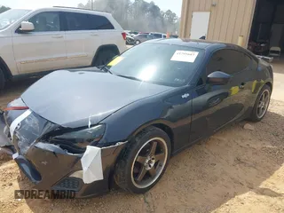 2016 Scion FR-S with VIN JF1ZNAA13G9702833, listed as a IAAI auction lot 41795687 with 71,161 mi miles and . Bid and sale history available at carsss.com. Image 2.