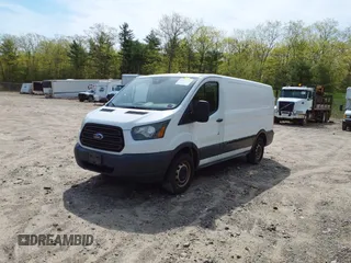2016 Ford Transit Cargo with VIN 1FTYE1YM0GKB19151, listed as a IAAI auction lot 42029234 with 240,441 mi miles and . Bid and sale history available at DreamBid. Image 2.