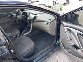 2015 Hyundai Elantra Limited with VIN KMHDH4AE7FU385081, listed as a IAAI auction lot 41911165 with 124,052 mi miles. Bid and sale history available at carsss.com. Image 5.