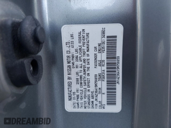 2005 Nissan 350Z Touring z VIN JN1AZ36A15M756659, wystawiony jako Copart lot #75458384 z przebiegiem 101 489 mil mil oraz Szkoda całkowita • Salvage title. Historia ofert i sprzedaży dostępna na DreamBid. Obrazek 14.